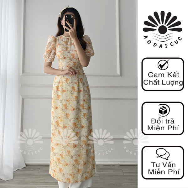 Áo dài hoa nhí von ép 4 tà, cổ tròn tay lỡ màu vàng cam trẻ trung, thanh lịch