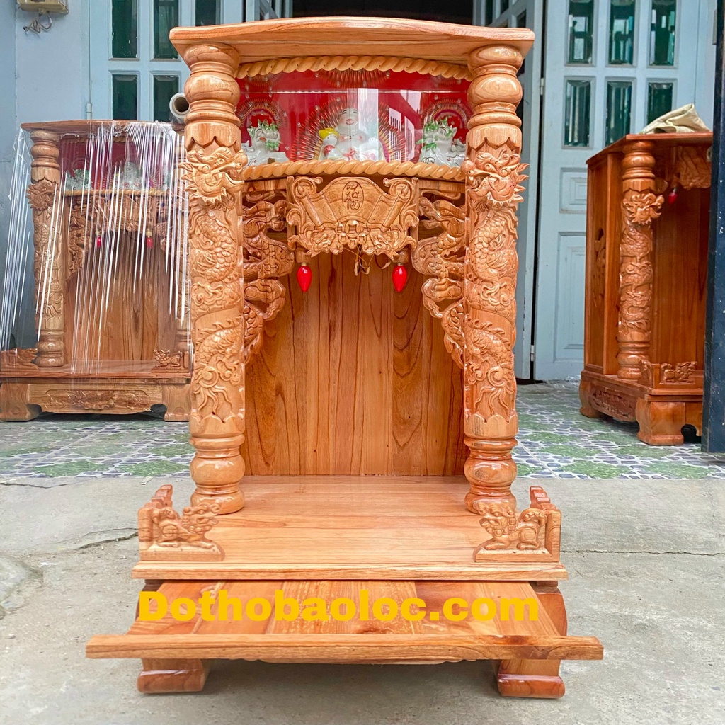 Bàn thờ thần tài ông địa gỗ xoan ngang 48cm quỳ trụ hộp điện tử -Đỏ
