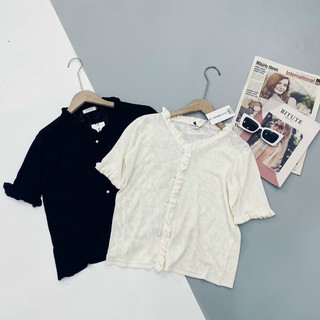 Áo len mongtogi dệt hoa nổi cổ V