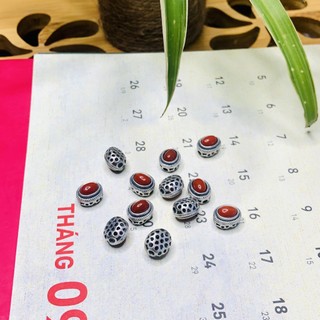 Charm bạc mắt rồng phong thủy