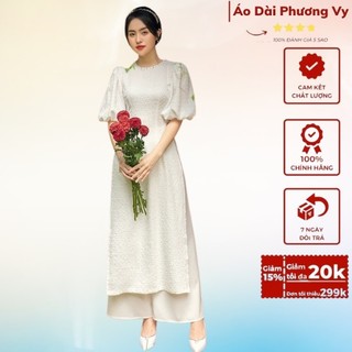 Áo Dài Thiết kế "Sương mai" vải vân nổi nhẹ nhàng, với thiết kế tay chuông nhẹ nhàng