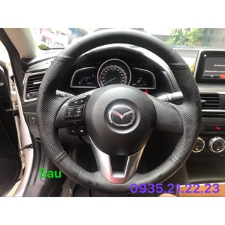 Bọc vô lăng da mazda loại khâu
