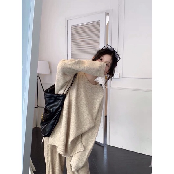 Áo len dệt kim cổ tròn dài tay xẻ tà đính cúc