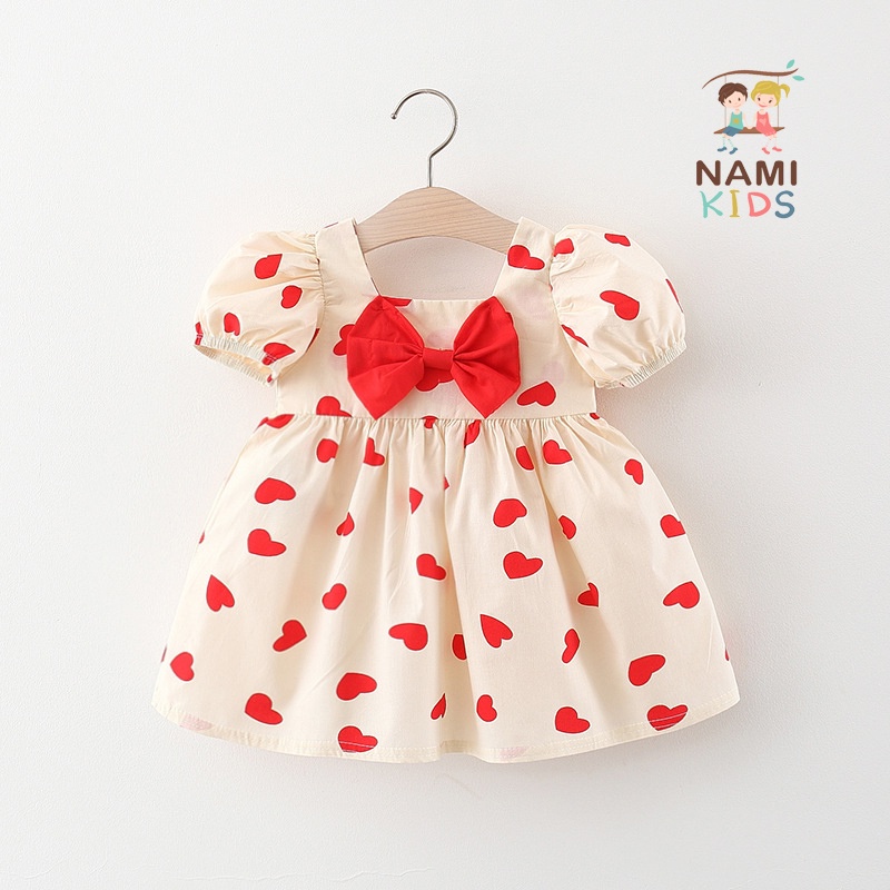 Đầm nơ tay bồng họa tiết trái tim dễ thương cho bé gái