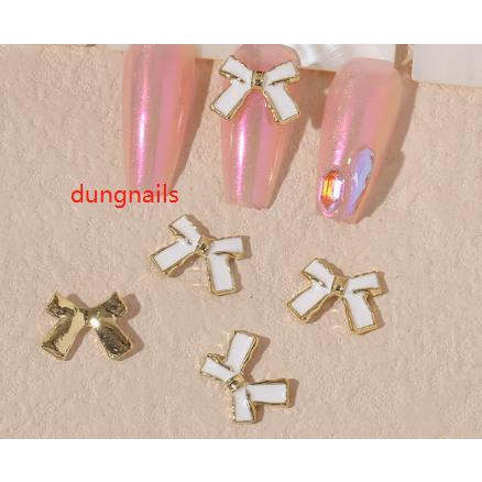 charm nơ đen trắng nail mã mới