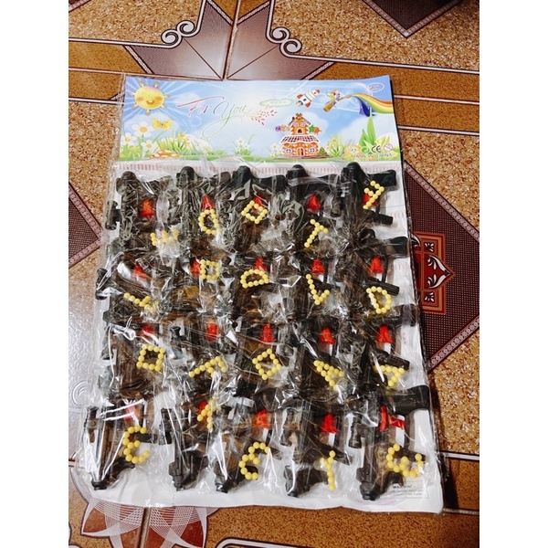 ải vỉ 20 bộ đồ chơi đen kèm vòng bi