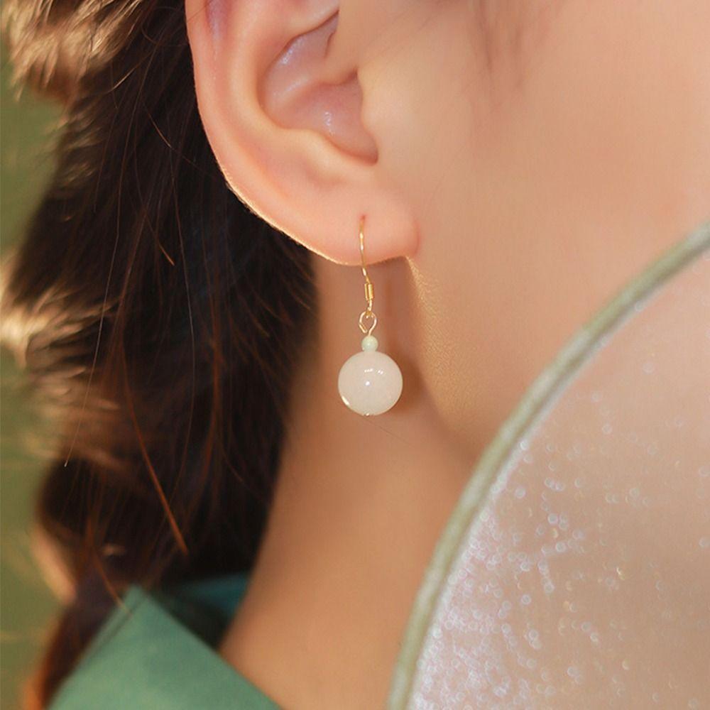 Khuyên Tai Lủng Lẳng Xỏ Hạt Đồng Xanh Lá Thiết Kế Thời Trang Cổ Điển Cho