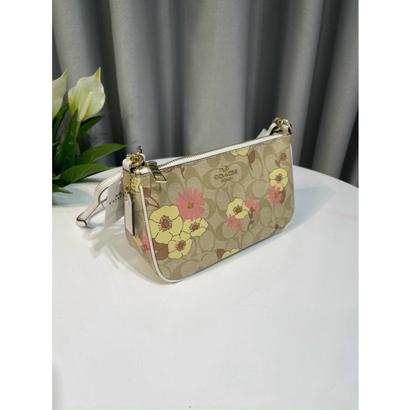 Túi Coach dáng thuyền hoạ tiết xinh xắn