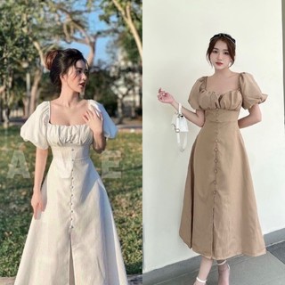 Váy maxi trắng nút bọc xẻ tà