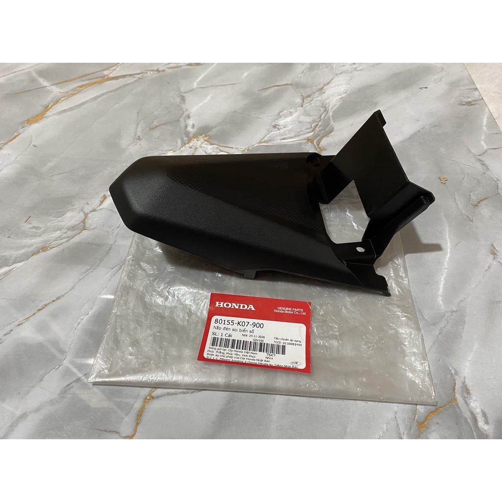 Nắp đèn soi biển số HONDA WAVE RSX110 năm 2012-2013. 80155K07900
