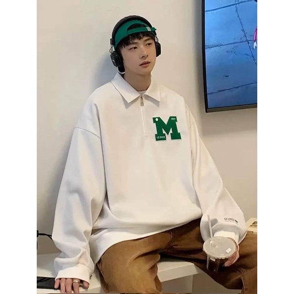 Áo polo chữ M khoá thêu đáp KA899
