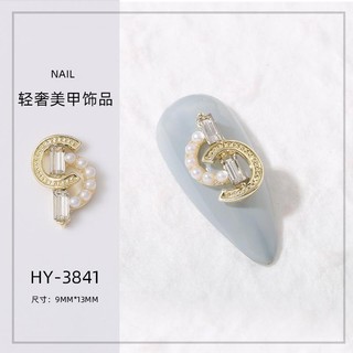 Charm đính móng mã 38