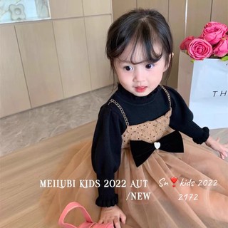 Váy len nhung phối nơ chấm bi bé gái