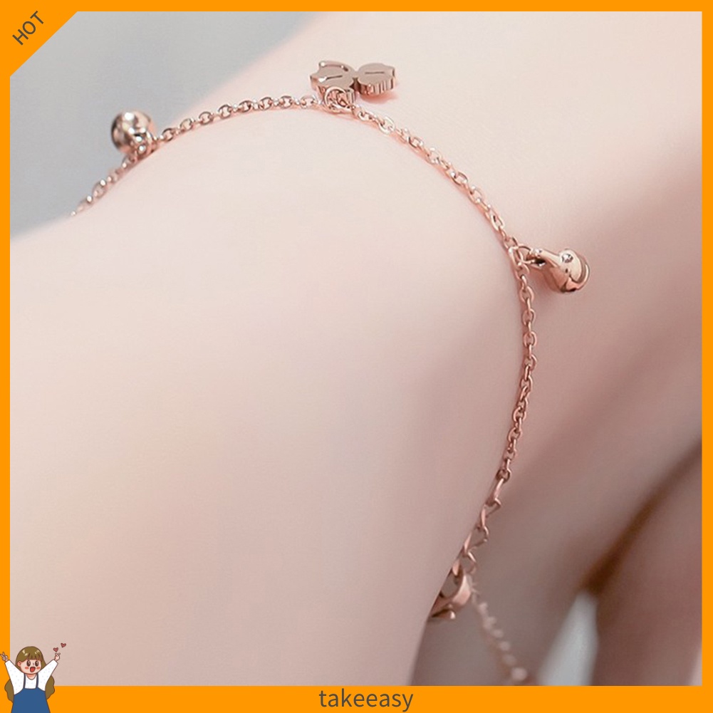 Lắc chân nữ phối mặt hình cỏ bốn lá và chuông may mắn