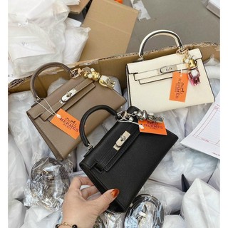Túi H 19cm khuy tag bạc
