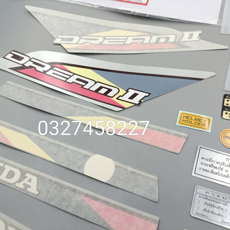 Full bộ tem hồng, chữ lớn xe DREAM thái luôn tem thông số zin