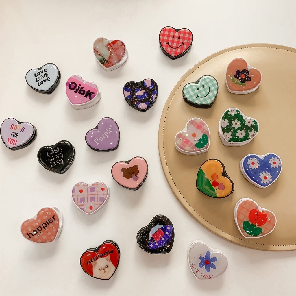 PK256 CHÂN CHỐNG ĐT NHỰA BÓNG HEART HỌA TIẾT (PHONESTAND)