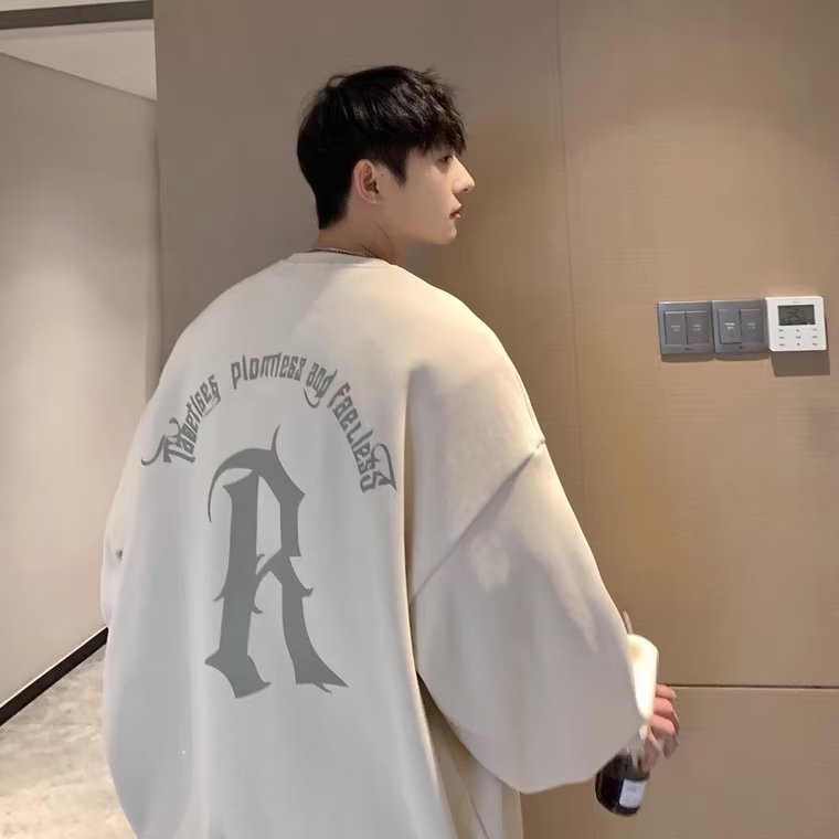 Áo Sweater Dáng Rộng Cổ Tròn Tay Dài Oversize In Logo Font Arc Và Hoa Màu Mơ Sữa