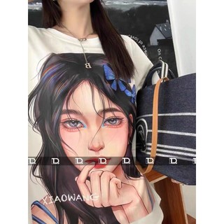 Áo phông cô gái nơ xanh cánh b.ướm