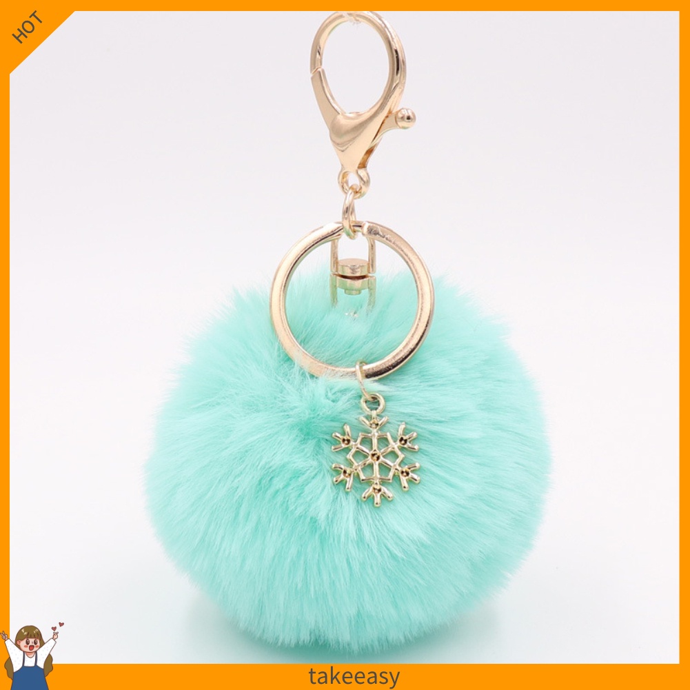 Móc khóa hình bông tuyết đính banh xù dễ thương