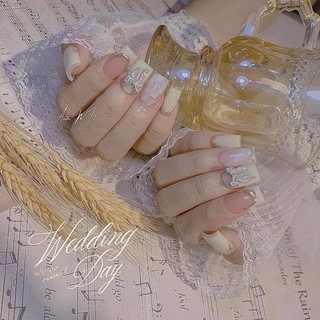 Móng up thiết kế, Nailbox thiết kế giá rẻ - mẫu nail trắng sữa charm nơ nhẹ nhàng