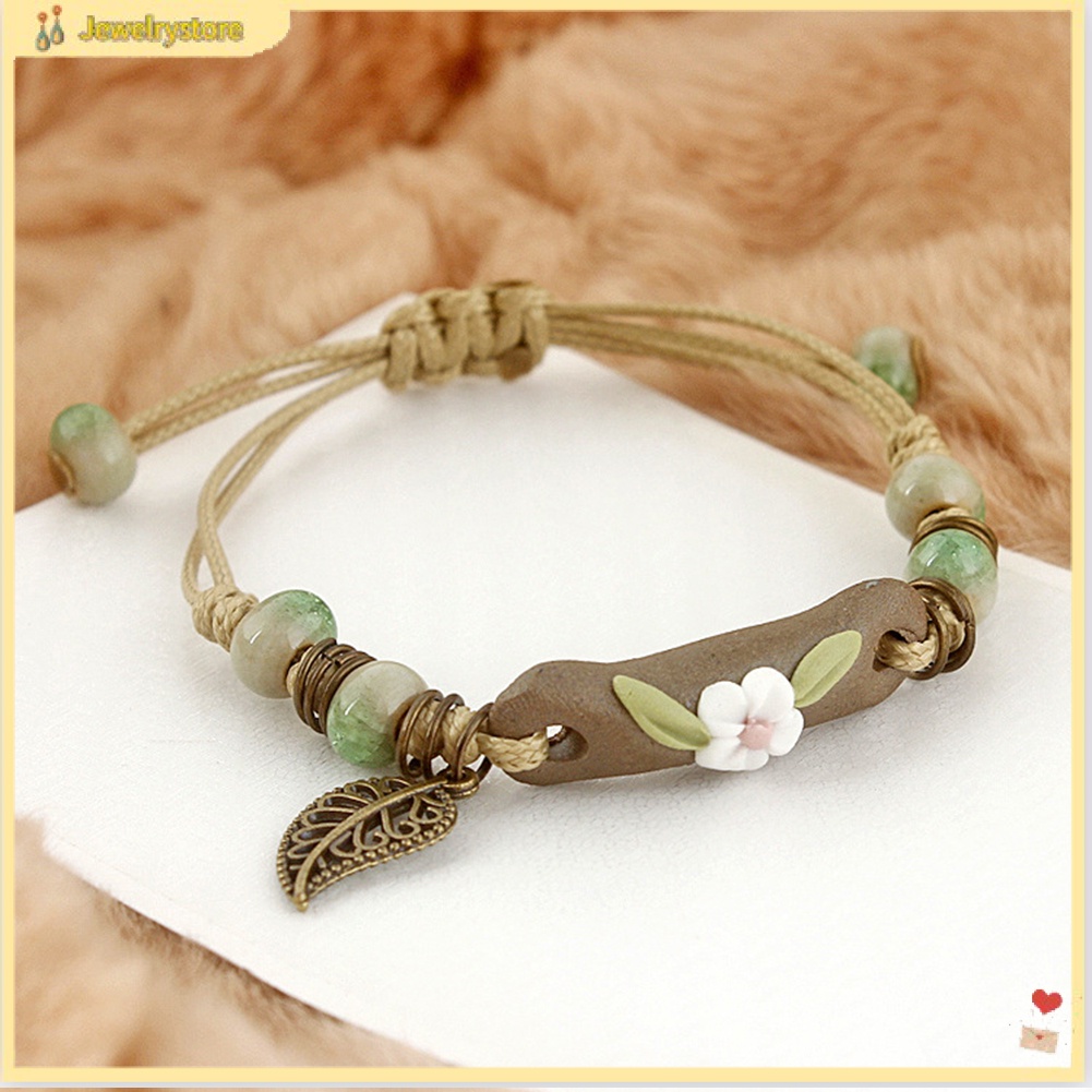 Vòng tay dây bện phối mặt charm gốm hình hoa và lá thời trang cho nữ