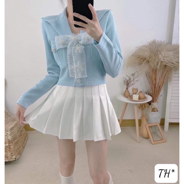 Áo len cổ vest đính nơ
