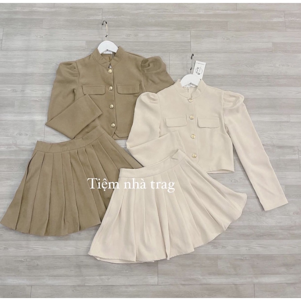 Sét váy xếp ly tuyết mưa Hàng siêu xịn, mặc lên cực sang luôn ạ. Thiết kế lên chuẩn mẫu. Áo đóng cúc đồng. Chân váy có q