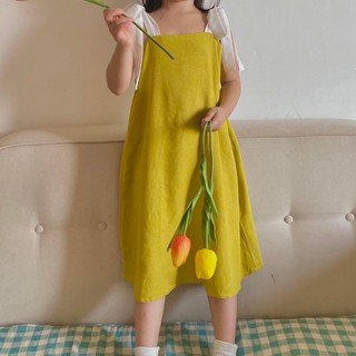 Đầm thiết kế cột nơ cho bé
