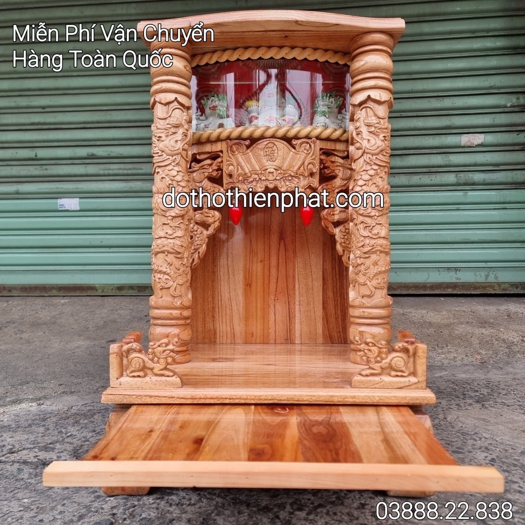 Bàn thờ thần tài ông địa gỗ xoan quỳ trụ điện tử ngang 68cm mẫu mới rất đẹp