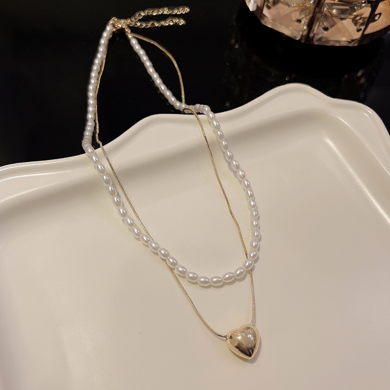 Vòng Cổ Choker Ngắn Hai Lớp Bằng Kim Loại Đính Hạt Ngọc Trai Hình Trái Tim Màu Vàng Kim Phong Cách Pháp Cho Nữ