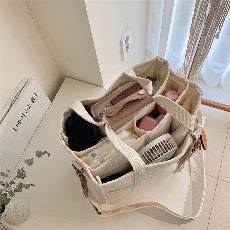 Hàn Quốc ins Mommy Bag Canvas Mommy Bag Thời trang đa chức năng Mother&Baby Single Shoulder Slant Bag Túi vải Tote Túi vải cho trẻ sơ sinh Túi mẹ đa chức năng Túi mẹ công suất lớn