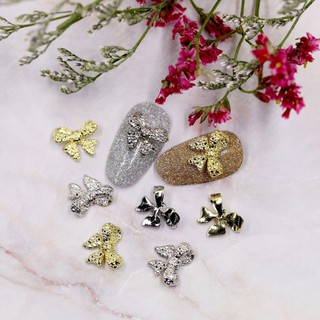 Charm nail nơ sắt màu vàng bạc