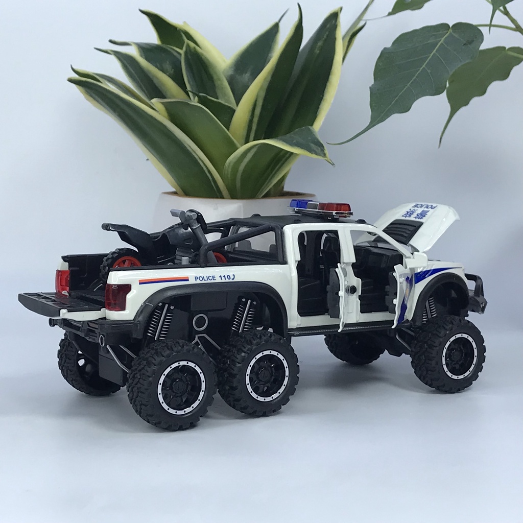 Mô hình xe cảnh sát Ford F150 Raptor 6x6 tỷ lệ 1:28 bằng kim loại có đèn chớp ưu tiên và còi hú chuyên dụng