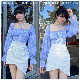 Set áo trễ vai hoa xanh tay loe phồng kèm chân váy trắng tà đắp chéo nàng closet