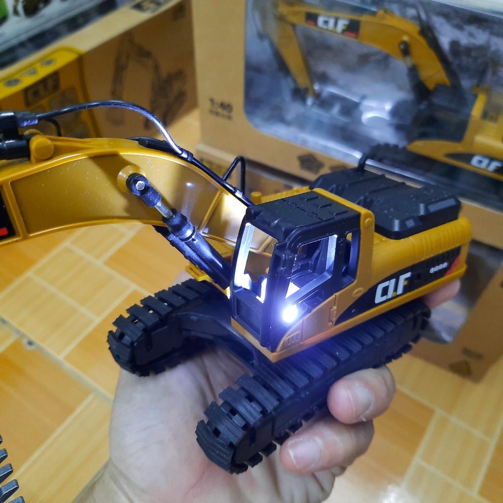 Xe cẩu xúc mini đồ chơi trẻ em - mô  hình bằng hợp kim nhựa có đèn sáng