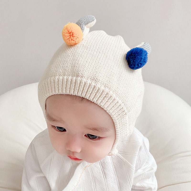 Mũ beanie Trùm Tai Giữ Ấm Đính Quả Bông Dễ Thương Cho Bé 0-12 Tháng Tuổi