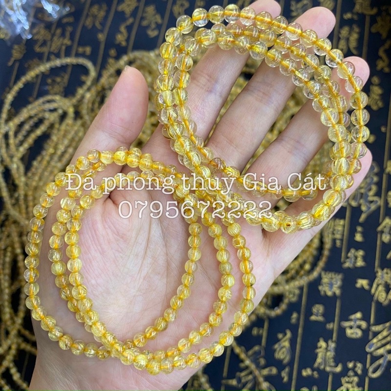 Vòng tay đá thach anh tóc vàng quấn có kiểm định