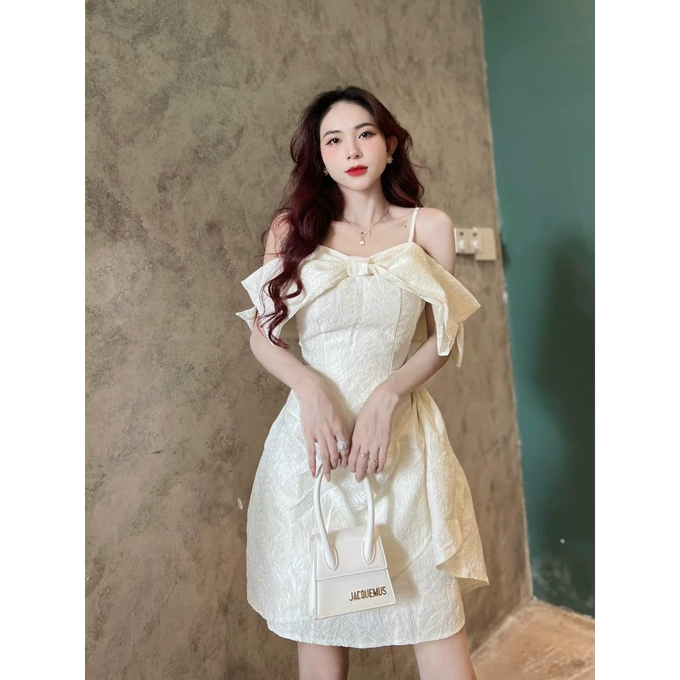 Đầm nữ thời trang mặc đi tiệc chất gấm hai dây phối nơ ngực có mút váy chữ A phối tà phong cách