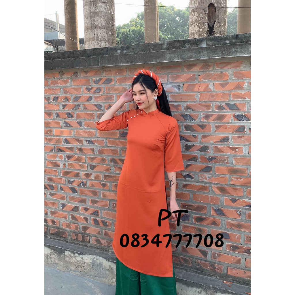 Áo dài nữ cách tân màu cam tây trơn sang trọng, quý phái kèm mấn xinh