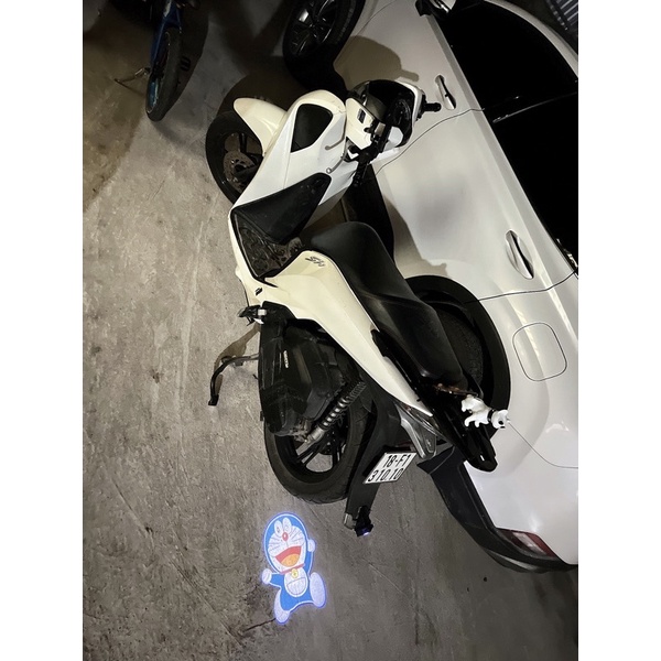 ĐÈN CHIẾU HÌNH CHUYỂN ĐỘNG GẮN XE không dây,pin sạc,bao chất