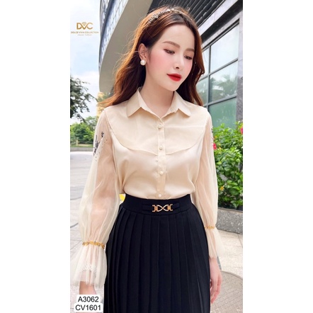 A3062 cv1601 áo sơ mi màu be và chân váy xếp ly màu đen