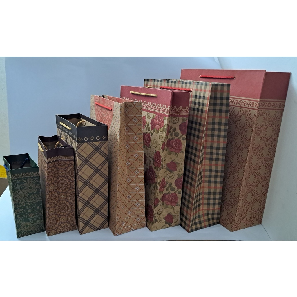 Túi giấy đựng quà, túi quà tặng giấy kraft định lượng 250 gsm, có quai xách, nhiều kích thước.