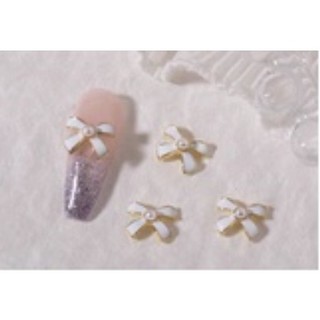 charm nơ trắng đen nail