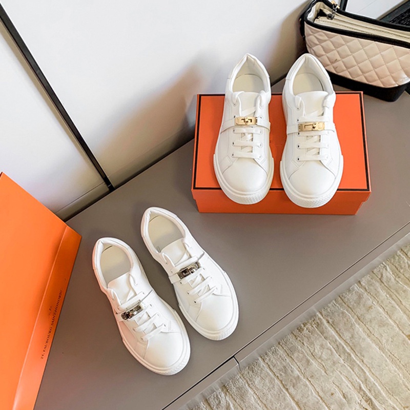 FOTX Herm ès 2021 new metal buckle thick bottom fashionable flat white shoes women's casual sports shoes lace-up board shoes single shoes