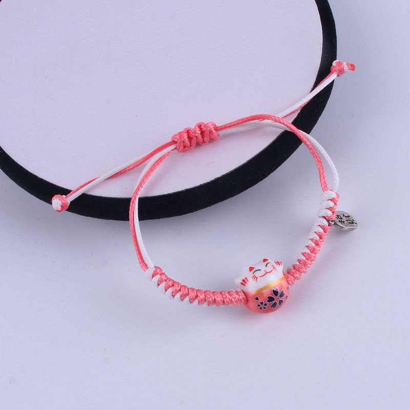vòng tay chỉ mèo sứ may mắn