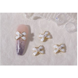 charm nơ trắng đen nail