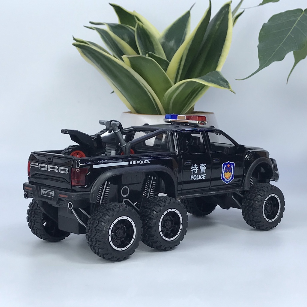 Mô hình xe cảnh sát Ford F150 Raptor 6x6 tỷ lệ 1:28 bằng kim loại có đèn chớp ưu tiên và còi hú chuyên dụng