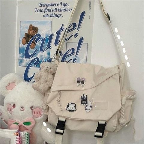 🔥Sẵn sàng giao hàng🔥Phiên bản Hàn Quốc Túi nữ dung tích lớn Túi nylon đeo vai Harajuku Túi Messenger thông thường