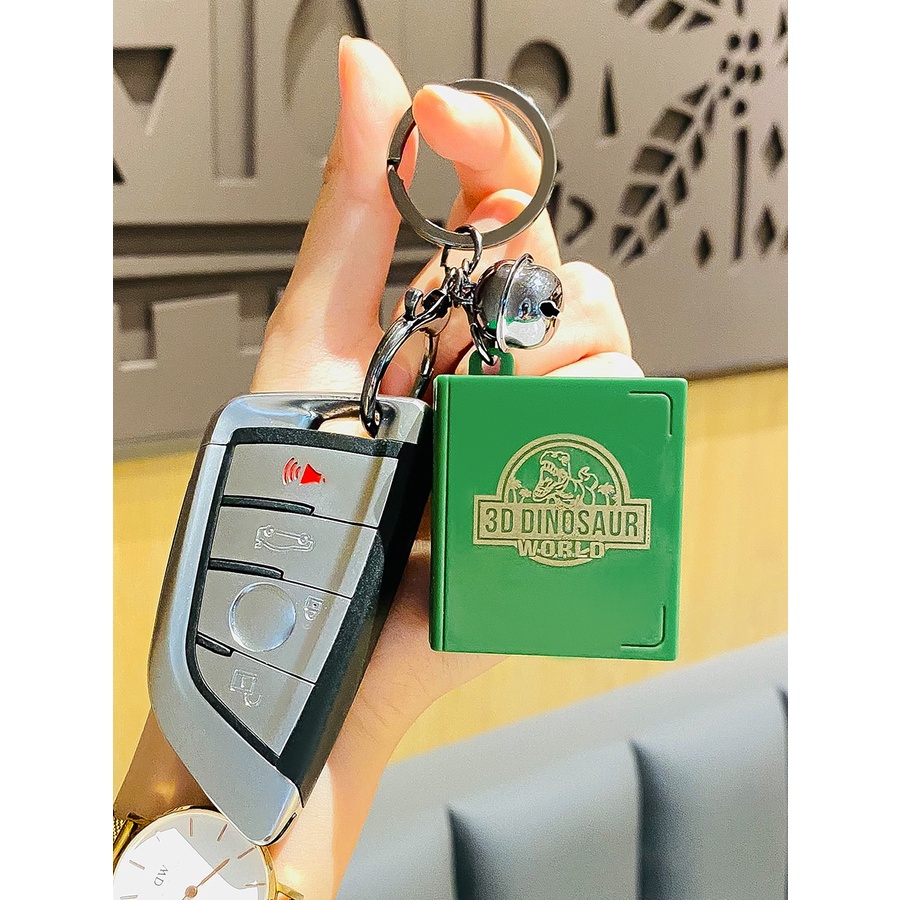 Móc chìa khóa hình cuốn sách khoa học 3D gấp gọn hình khủng long mini/ phi hành gia làm đồ chơi quà tặng cầm tay cho trẻ